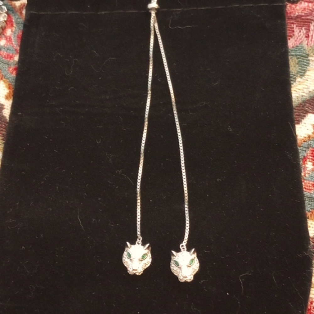 Lioness necklace with green emerald eyes